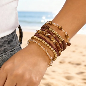 Bohemian elastic beaded bracelet set featuring coffee brown and gold tones for women