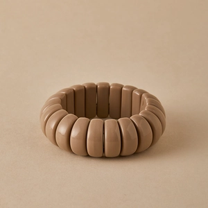 Close-up of mocha brown beaded bracelet featuring glossy resin rectangular beads