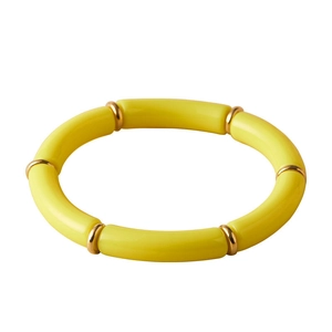 Boheemse gele acryl stretch armband met goudkleurige metalen tussenringen voor dames