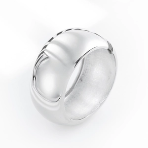 Macro detail of silver wide curved ring showing polished mirror finish and brushed inner metal