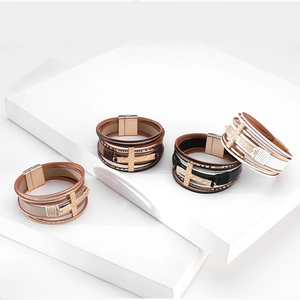 Multilayer leather bracelet with gold cross and magnetic clasp in four distinct colors