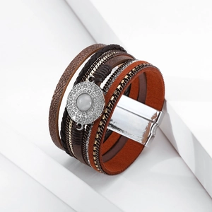 Detail of bohemian multilayer leather bracelet with crystal charm and magnetic clasp