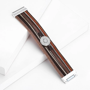 Detail of bohemian multilayer leather bracelet with crystal stones and magnetic clasp
