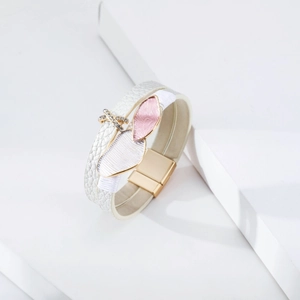 Detail of layered leather wrap bracelet with pink enamel leaves and rhinestone X charm