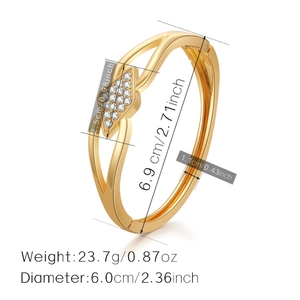 Detailed view of golden rhombus bangle with dimensions and weight specifications