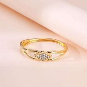 Minimalist gold-plated open bangle with a diamond-set rhombus charm and split shank design