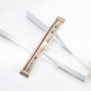 Detail of bohemian multilayer leather bracelet with marble stone and magnetic clasp