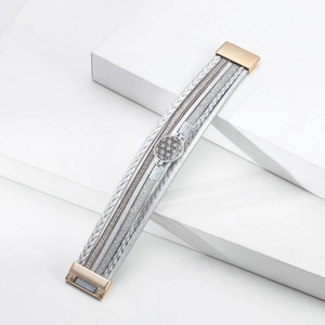 Detail of bohemian multilayer wrap bracelet with silver leather and glitter magnetic clasp