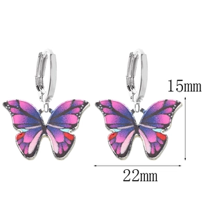 Boucles d'oreilles papillon colorées avec des ailes violettes et magenta vives