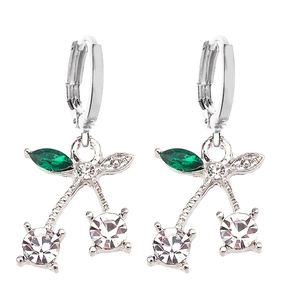 Detail view of cherry earrings with sparkling clear cubic zirconia and green leaf stones