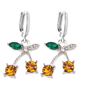 Elegant cherry pendant earrings with orange crystals and green leaves on silver metal