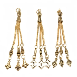Three vintage gold alloy prayer bead tassel pendants with ornate metal chain fringes