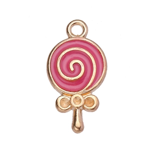 Detail of pink enamel lollipop pendant with golden metal frame and spiral texture