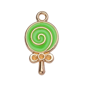 Detailed macro view of green enamel lollipop charm with golden metal bow for DIY jewelry