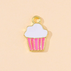 Detail of cupcake charm with pink and white enamel drip on a gold alloy metal base