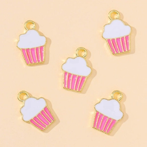 Detailed view of five pink and white enamel cupcake pendants for DIY jewelry making