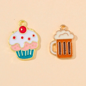Detail of alloy enamel charms showing cupcake with cherry and beer mug with white foam