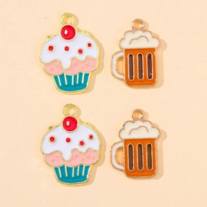 Macro view of colorful enamel cupcake and beer mug alloy charms for DIY jewelry making