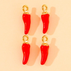 Detailed view of four red chili charms with gold loops for DIY jewelry making
