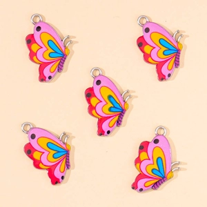 Cinq pendentifs papillons colorés avec pois noirs pour la création de bijoux DIY élégants