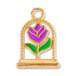 Macro shot of purple enamel rose pendant with gold rim and green leaf for DIY jewelry
