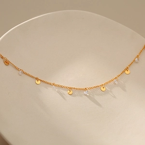Tobillera bañada en oro de 18K con discos redondos pulidos y colgantes de circonita