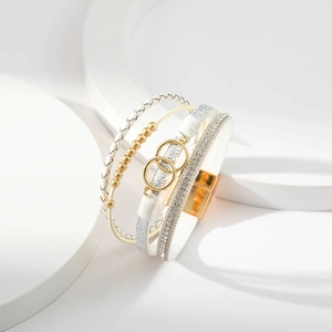 White leather multi-layer bracelet with gold beads and sparkling rhinestone accents