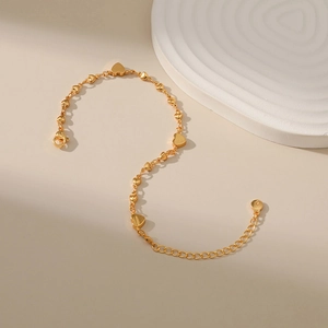 18K gold plated copper bracelet with solid heart links and adjustable lobster clasp