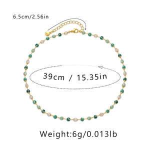 Detail of 18K gold-plated necklace with green crystal beads and adjustable lobster clasp