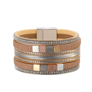 Close-up of bohemian multilayer leather bracelet with rhinestones and magnetic clasp
