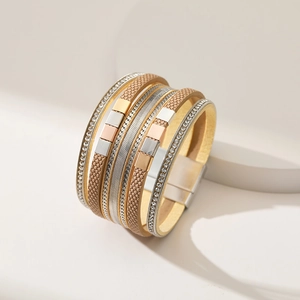 Detailed view of multilayer leather bracelet with magnetic clasp and rhinestones
