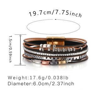 Detail view of multi-layer leather bracelet with metallic beads and magnetic clasp