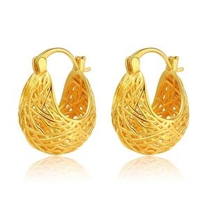 Golden irregular birdcage earrings with hollow woven texture and snap closure on white background