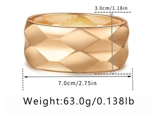 Detail view of a wide gold bangle with geometric diamond pattern and size measurements