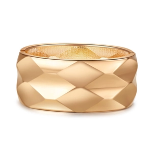 Minimalist wide rose gold bangle featuring geometric quilted diamond textured pattern