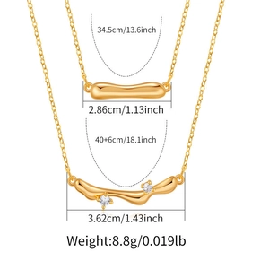 Detailed view of dual-layered gold necklaces with size measurements and stone accents