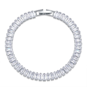 Minimalist silver tennis bracelet with rectangular zircon flower design on white background