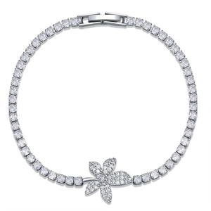 Silver flower tennis bracelet with sparkling cubic zirconia on a white background
