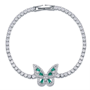 Silver butterfly tennis bracelet with green emerald-cut stones and white zircon crystals