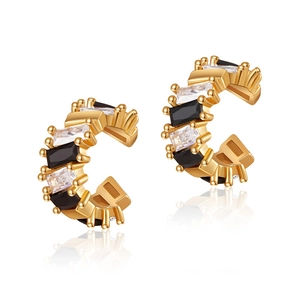 Two-tone C-shape ear cuff featuring alternating black and clear baguette crystals in gold