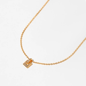 Detail of gold starfish heart necklace with rectangular pendant and inlaid zircons