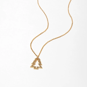 Close-up of golden Christmas tree necklace with sparkling white zircons on O-chain