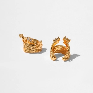 Close-up of 18K gold plated ear cuff featuring molten texture and micro zircon stones