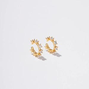 Detail shot of 18K gold plated ear cuff featuring radiant pavé cubic zirconia inlay