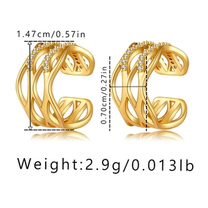 Detail view of 18K gold plated ear cuff with wave design and cubic zirconia settings