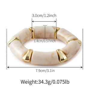 Detail showing dimensions of amber acrylic bangle with marble pattern and gold spacers