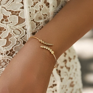 18K gold plated brass open bangle with sparkling cubic zirconia leaf heart design