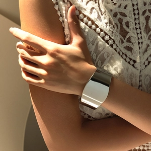 Polished silver wide cuff bracelet in minimalist geometric design for fashion-forward women