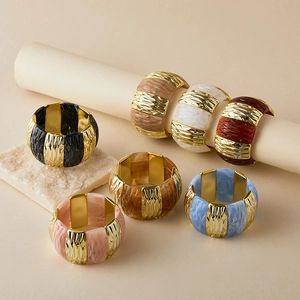 Bohemian wide stretch bracelet with gold textured metal and marble resin panels