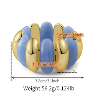 Detail view of gold beads and light blue marble resin beads with size measurements